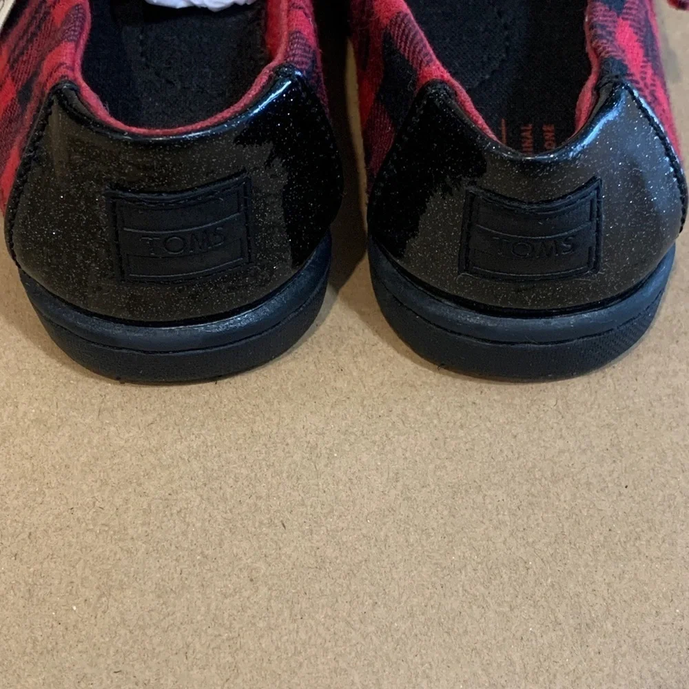 TOMS Black and Red Plaid Slip on shoes